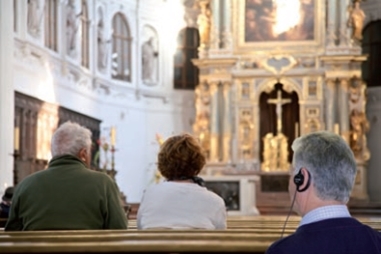 Tour guide system used for assistive hearing in cathedral